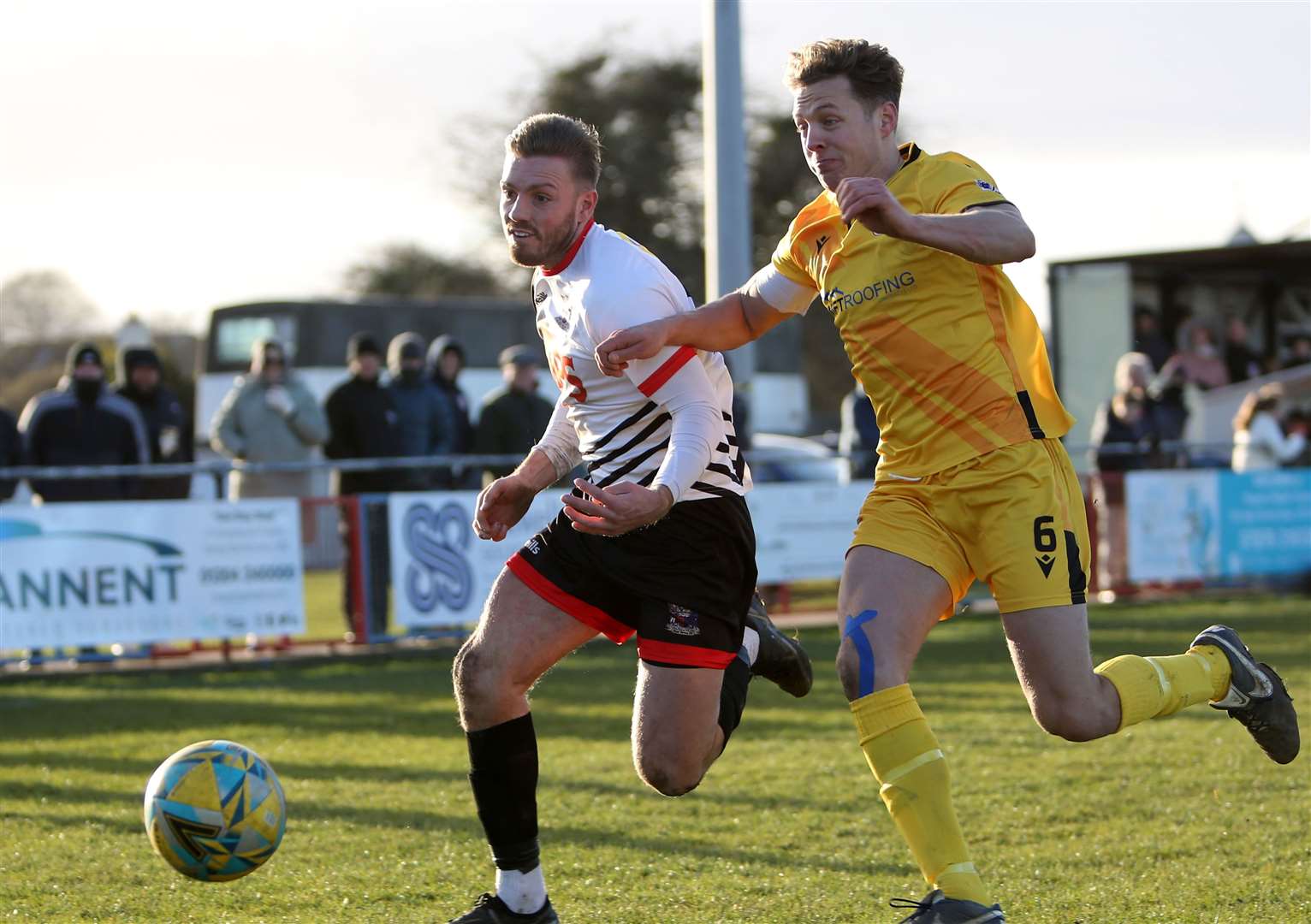 Deal striker Aaron Millbank and Bearsted captain Daniel Melvin challenge for the ball. Picture: Paul Willmott