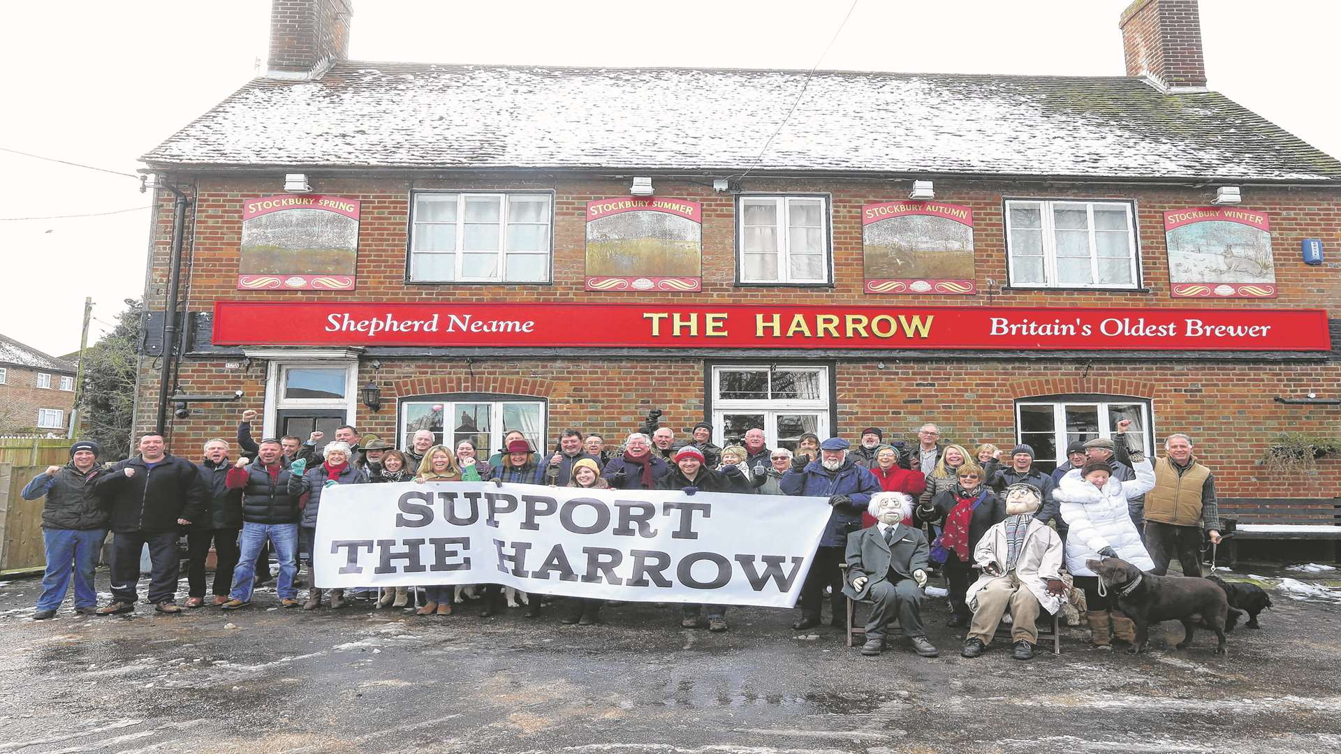Supporters to turn The Harrow Pub into a community pub gather outside the premises.