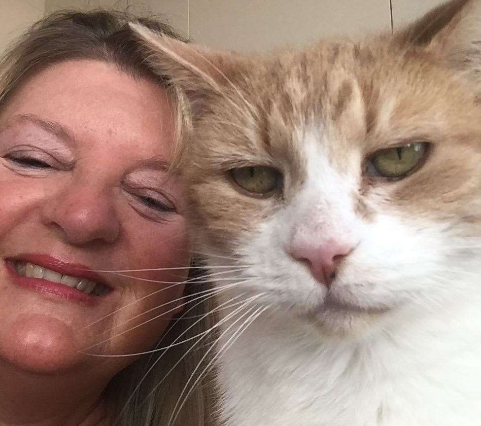 Seasalter resident Jayne Dawkins with her cat, Clearoff, who was found after reports of a "cat-napper". Picture: Jayne Dawkins