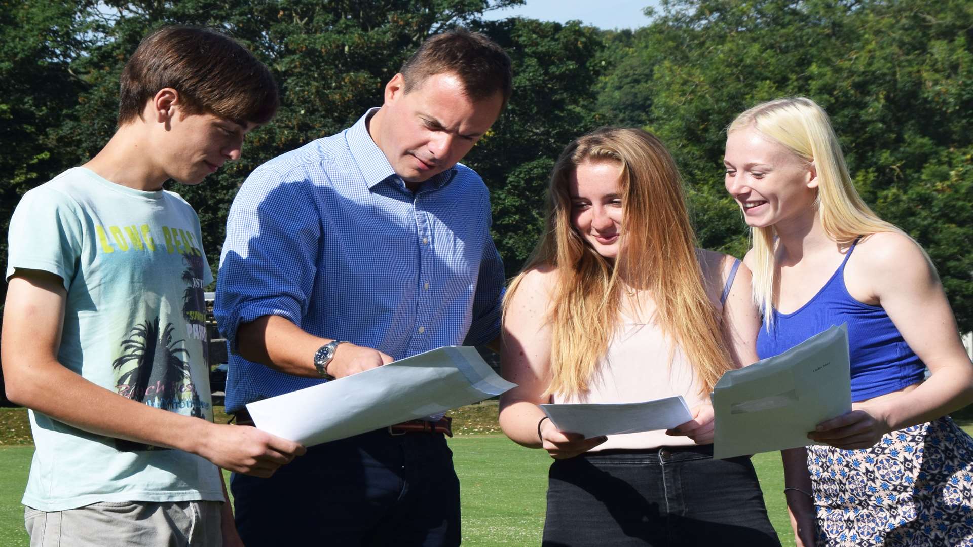 Dover College GCSE results. Pictured, from left, pupil Zach Rogers,headmaster Gareth Doodes and pupils Cordelia Gaskin and Macy Hadler.