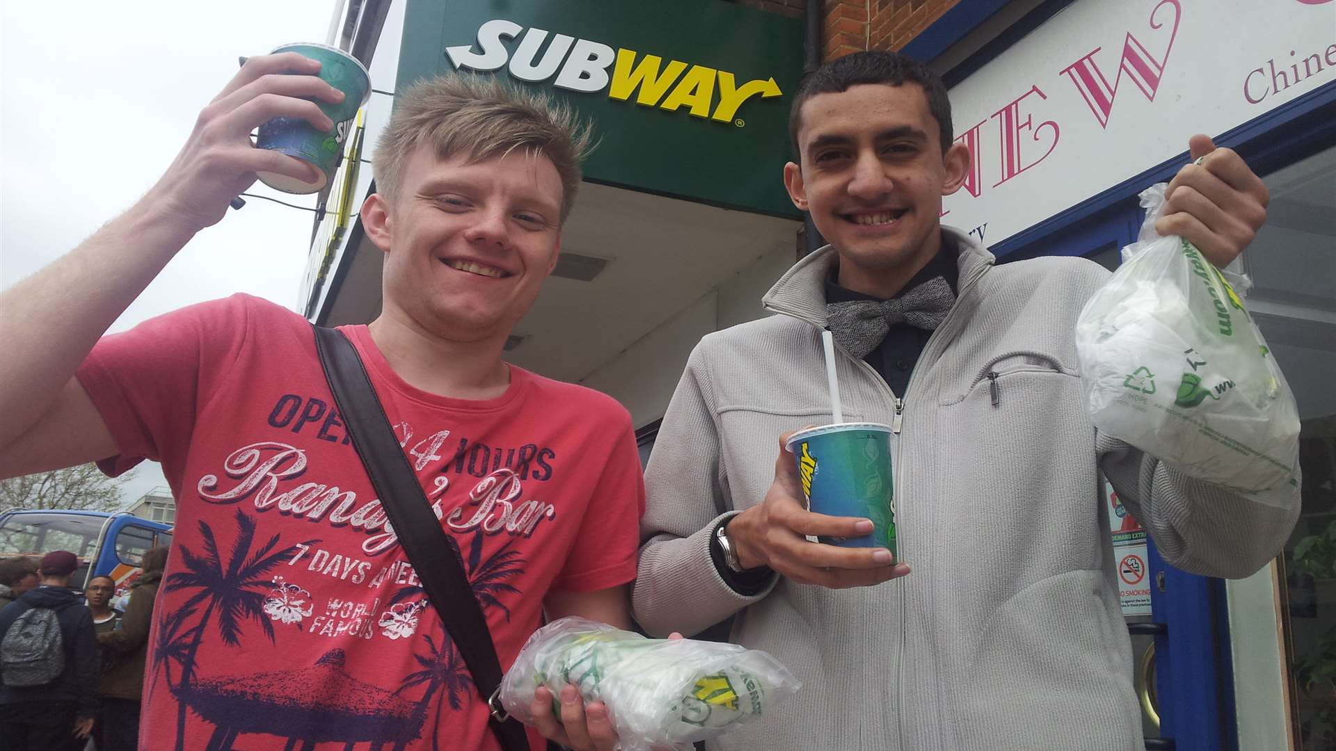 Among those queueing for a free Subway were students John Rose, left, and Jordan Cook