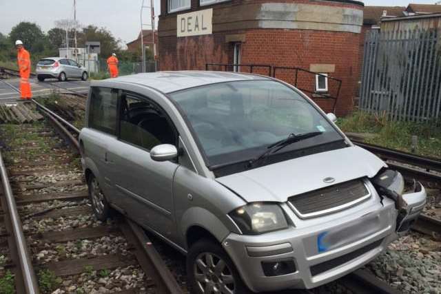 The car even straddled a live wire. Picture courtesy of Network Rail
