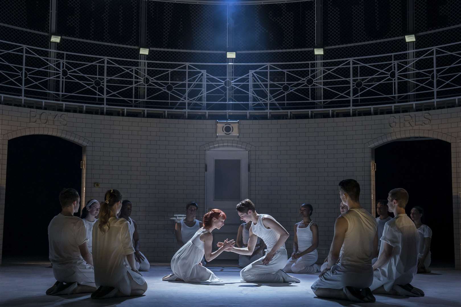 From the moment Romeo and Juliet set eyes on eachother, it felt like they were the only ones in the room. Matthew Bourne's Romeo and Juliet at the Marlowe Theatre. Credit: Johan Persson