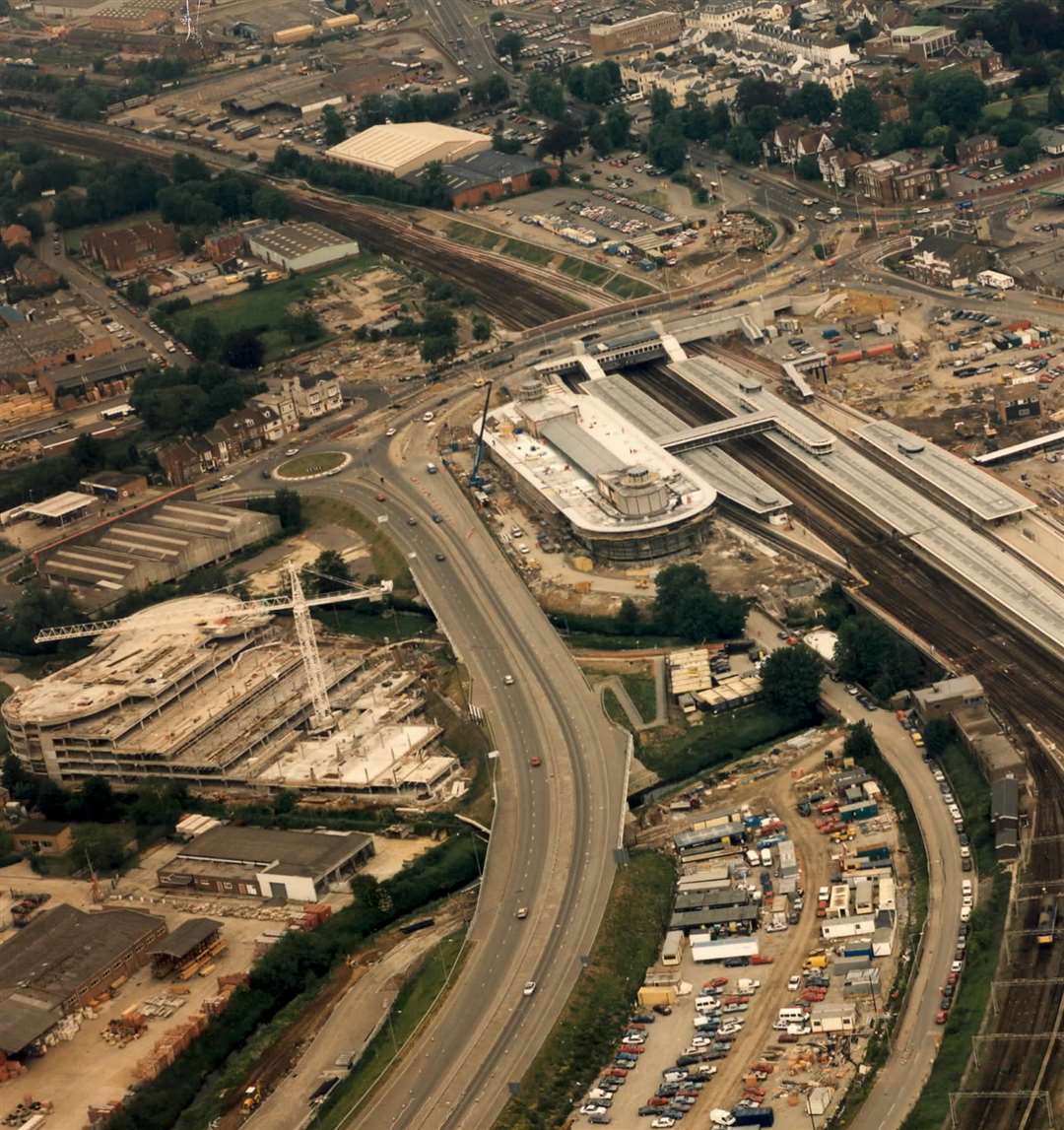 Aerial view of Ashford International train station under construction in 1995. The picture shows the changing face of Ashford, with the surrounding area now boasting a new college, brewery, Aldi supermarket and under-construction hotel.