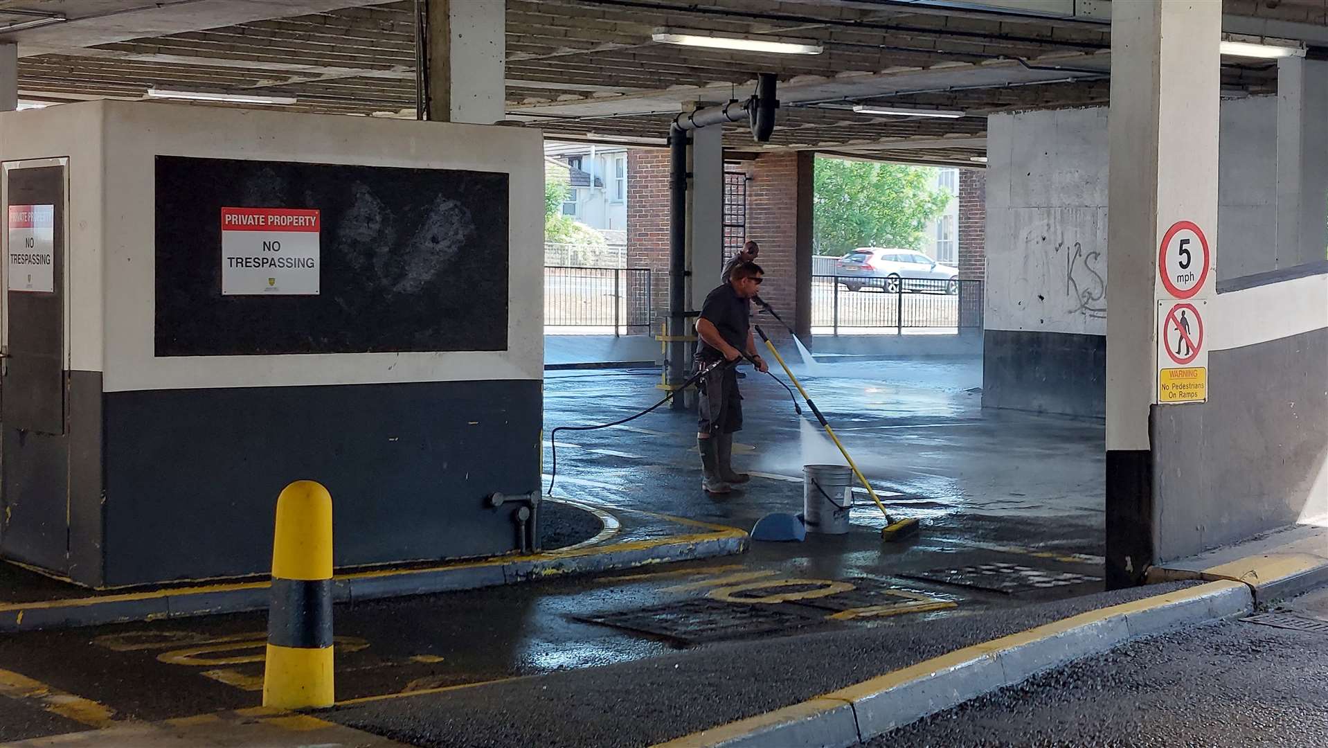 Cleaners have been jet washing the ground floor