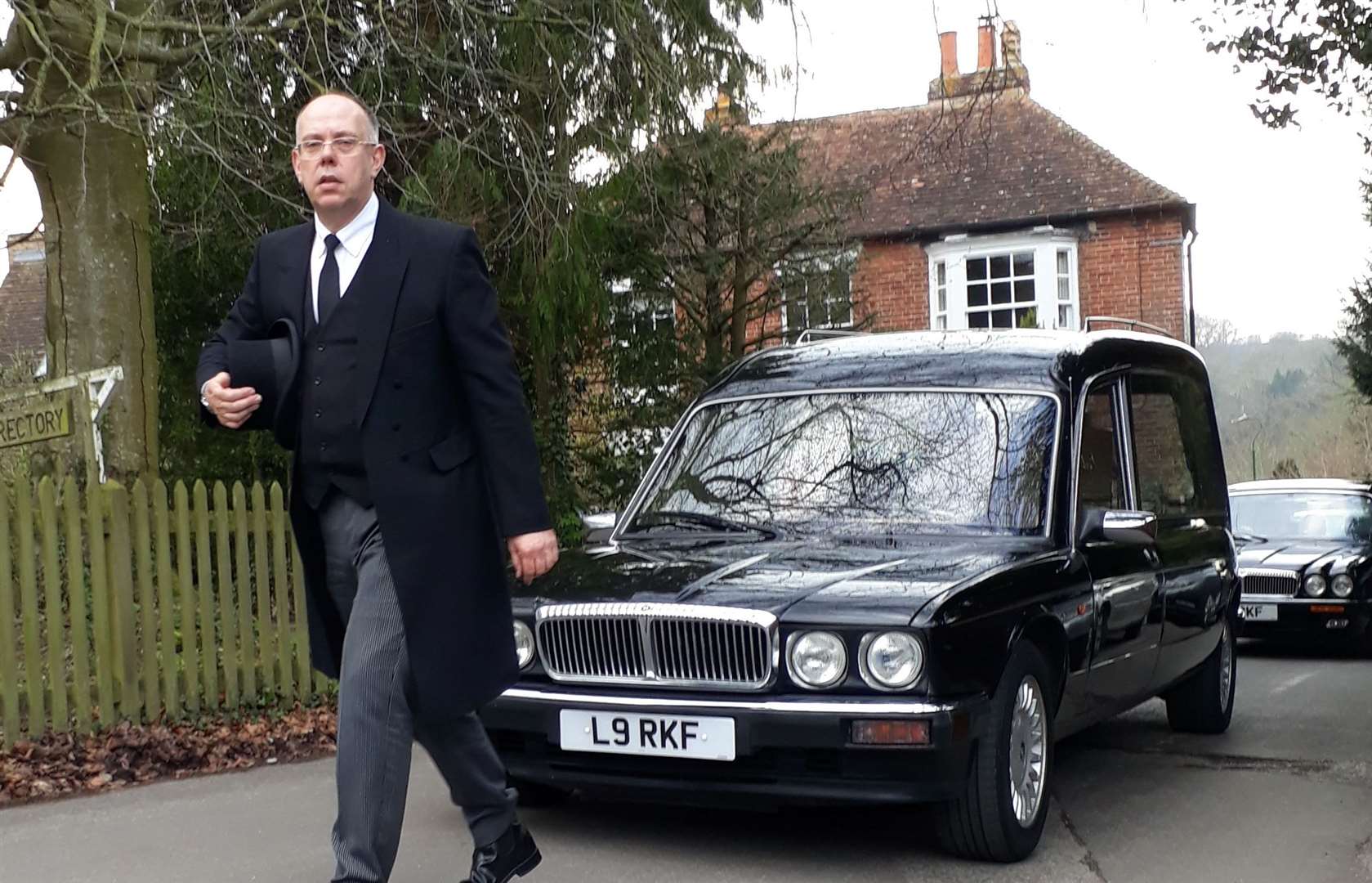 Robert Kent in his regular role of leading a cortege. Library image from Robert Kent Funeral Services