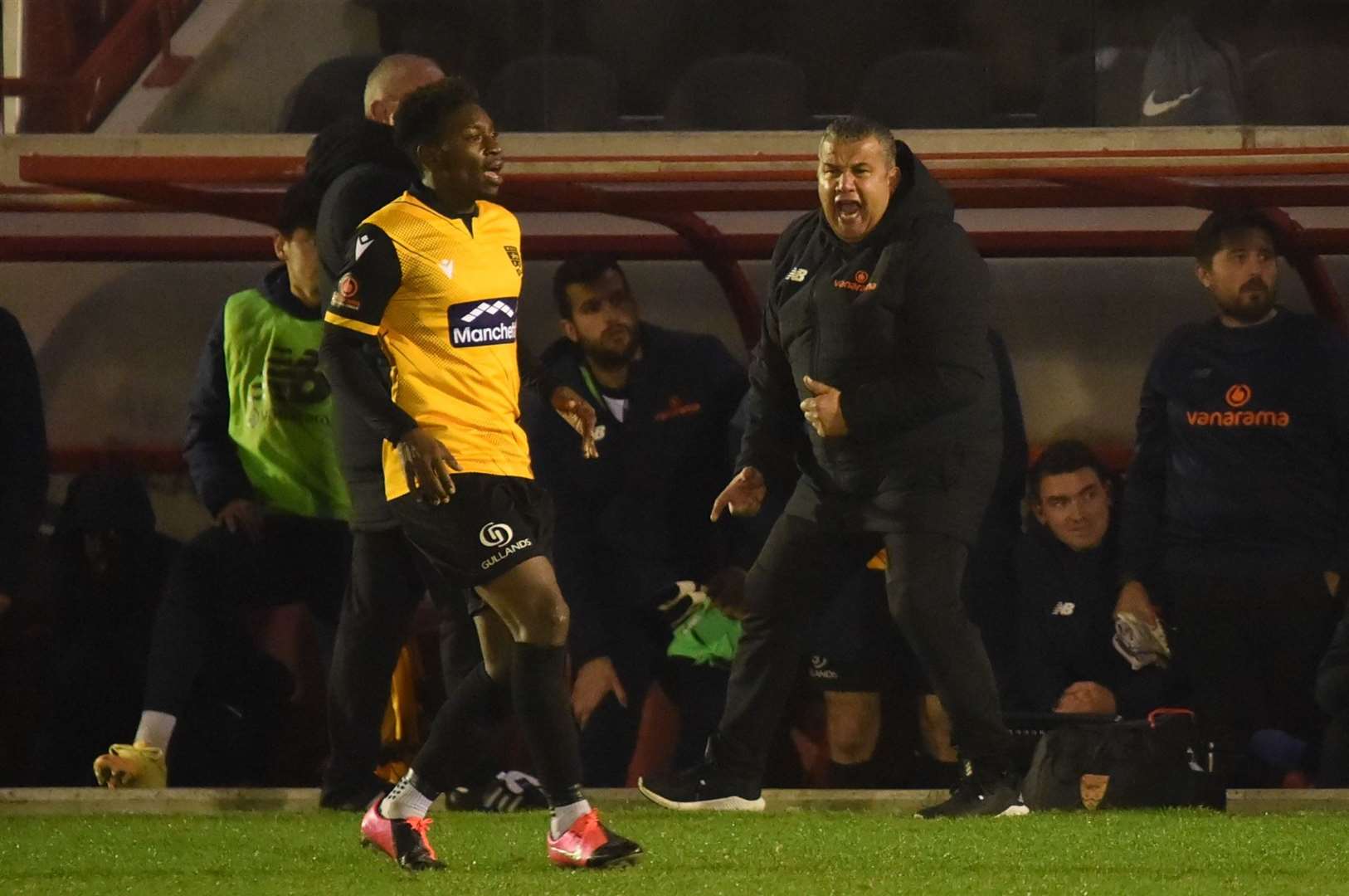 Maidstone United manager Hakan Hayrettin encourages his side as Jermaine McGlashan gets forward Picture: Steve Terrell