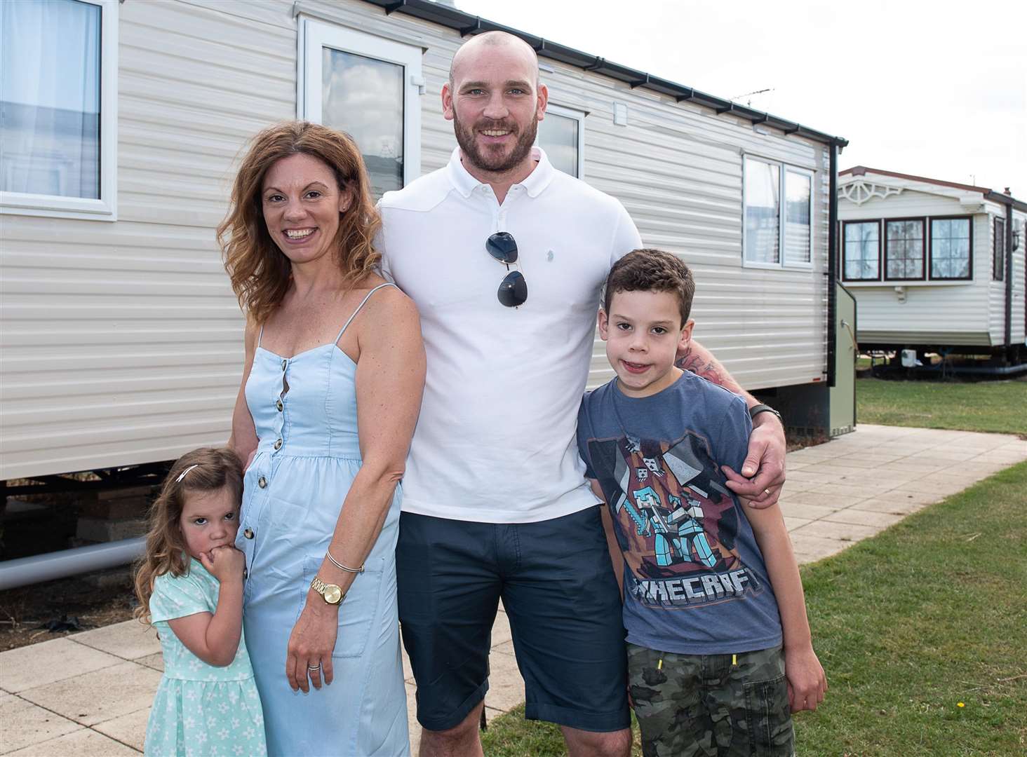 Rosie, Emma, Dean and Euan Giles outside of the caravan in Seaview Holiday Park. Picture: Alan Langley. ..... ...... (3374484)