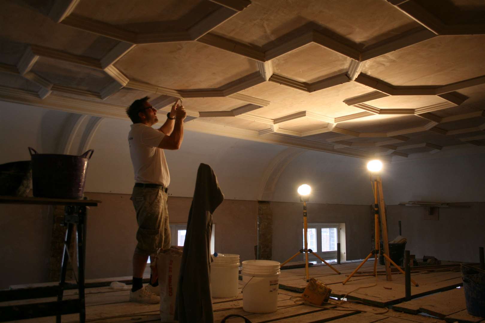 Work continues apace at the old Theatre Royal and bank buildings in Chatham High Street, which lay empty for years but won planning permission in 2013 to change to bars, cafes, restaurants and flats. Gary Neve fixes the ceiling in the old Circle bar