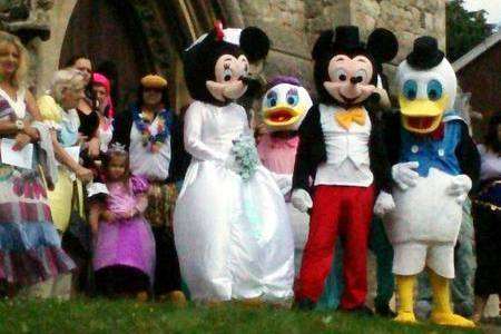 Julie Webb Flint and her husband Jason dressed as Minnie and Mickey Mouse at St Mary’s Church, Greenhithe