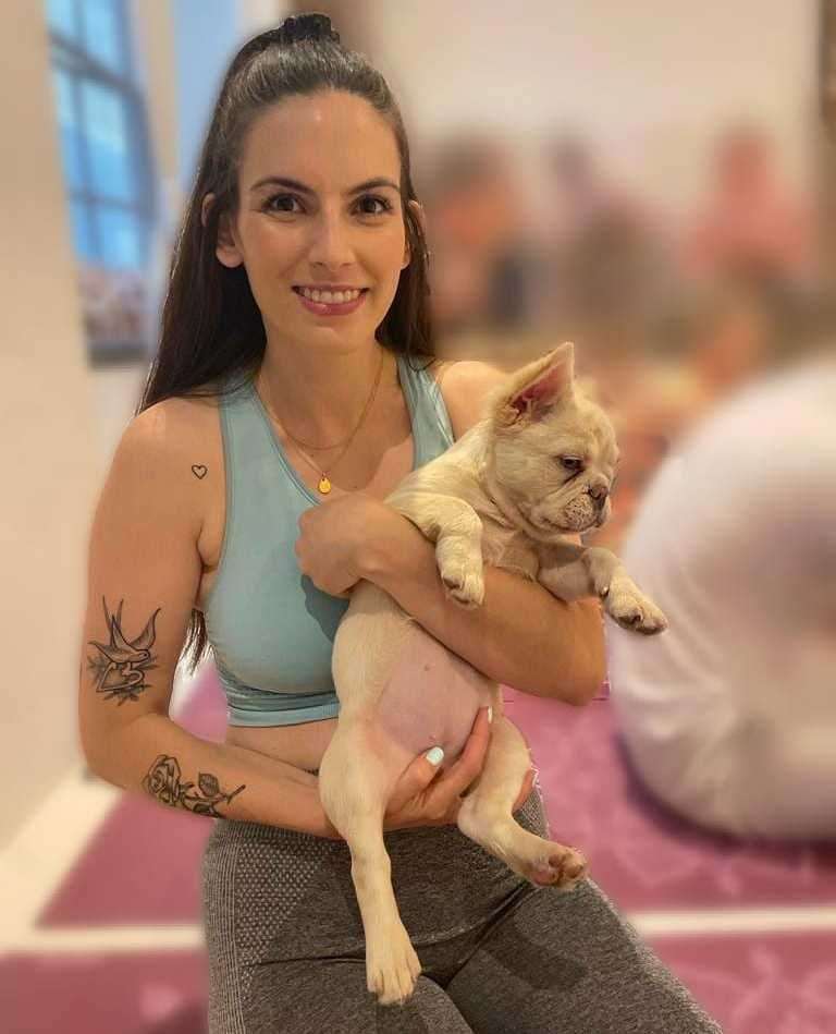 Katie Tulip, 32, started Happy Puppy Yoga in Kent after attending sessions in London. Picture: Katie Tulip