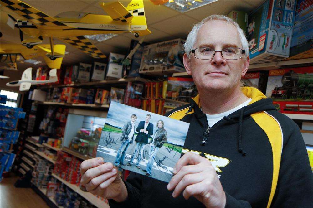 Mark Tilbury, owner of Model World Ltd, with his autographed photo of Top Gear stars