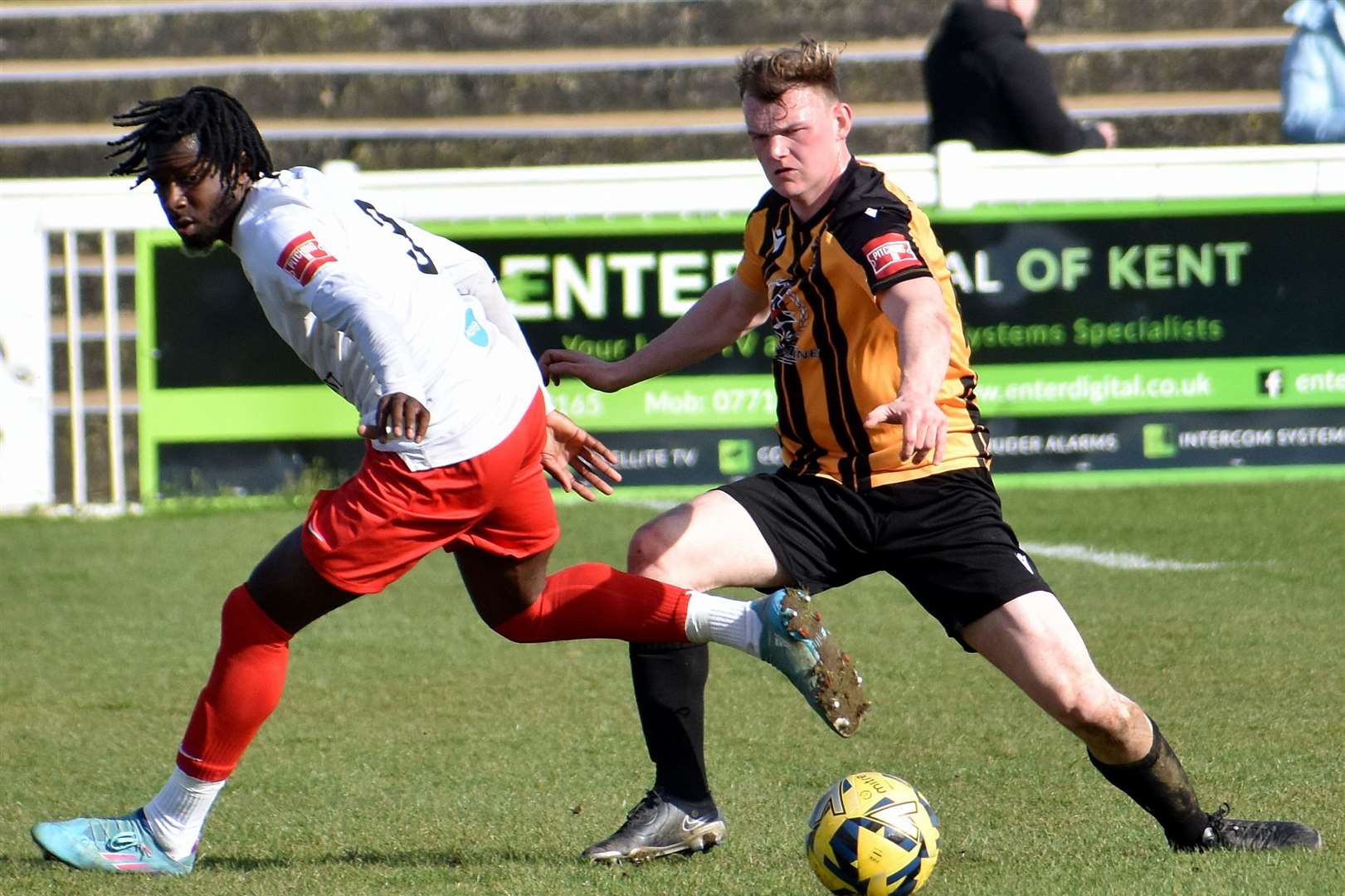 Folkestone's Cameron Brodie takes on Lewes in a 3-1 Isthmian Premier home win on Good Friday. Picture: Randolph File
