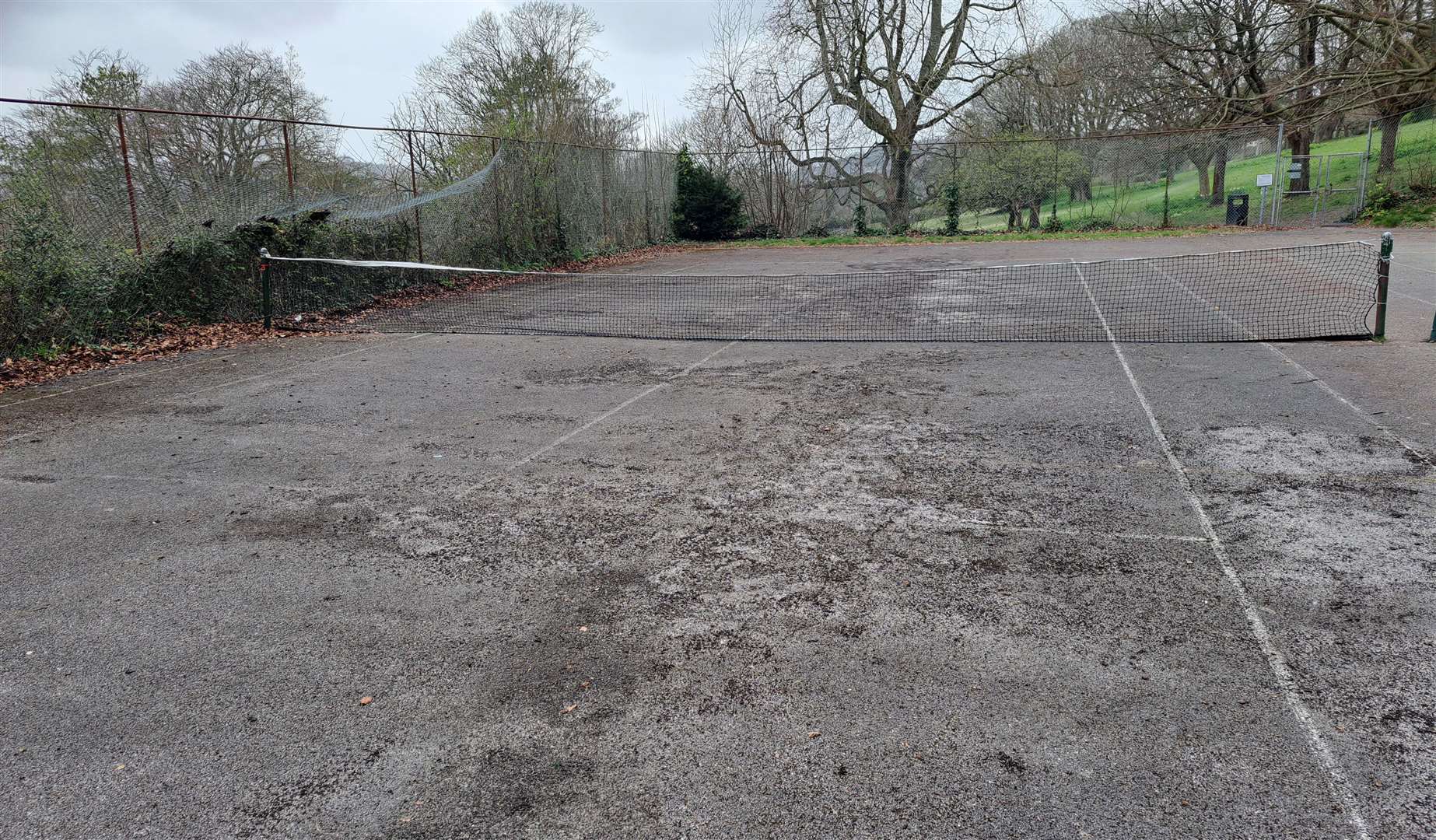 The tennis courts have fallen into a state of disrepair