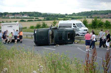 A 4x4 pulling a caravan overturned on the A228. Picture: Stanley Arrowsmith