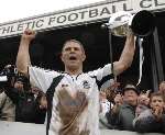 Andy Hessenthaler celebrating with the Ryman League Division 1 trophy