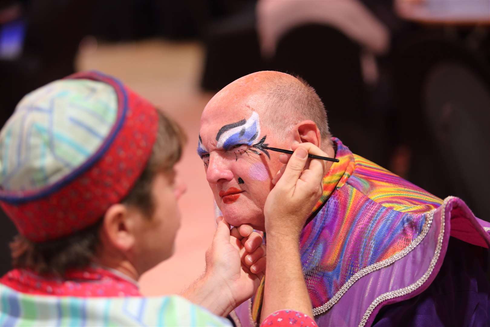 Step Two: A little 'slap' and tickle as John Nurden becomes a dame thanks to Michael 'Dizzy O'Dare' Imerson who plays Wishee Washee in Gravesend's panto Aladdin at The Woodville
