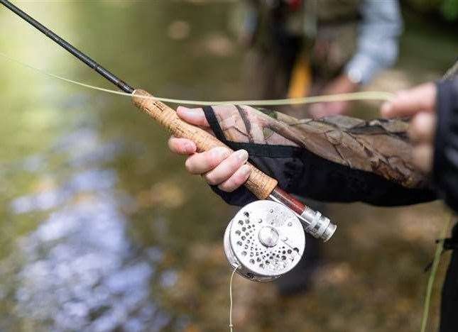 Two men have been found guilty and fined more than £500 between them after fishing without a license