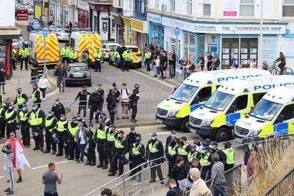 The last immigration protest in Dover on September 5, with a heavy police presence at York Street. Picture: Kevin Clark