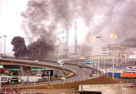 A plume of smoke from the caravan fire rises above the Port of Dover. Picture: PAUL BOLAND (www.doverforum.co.uk)