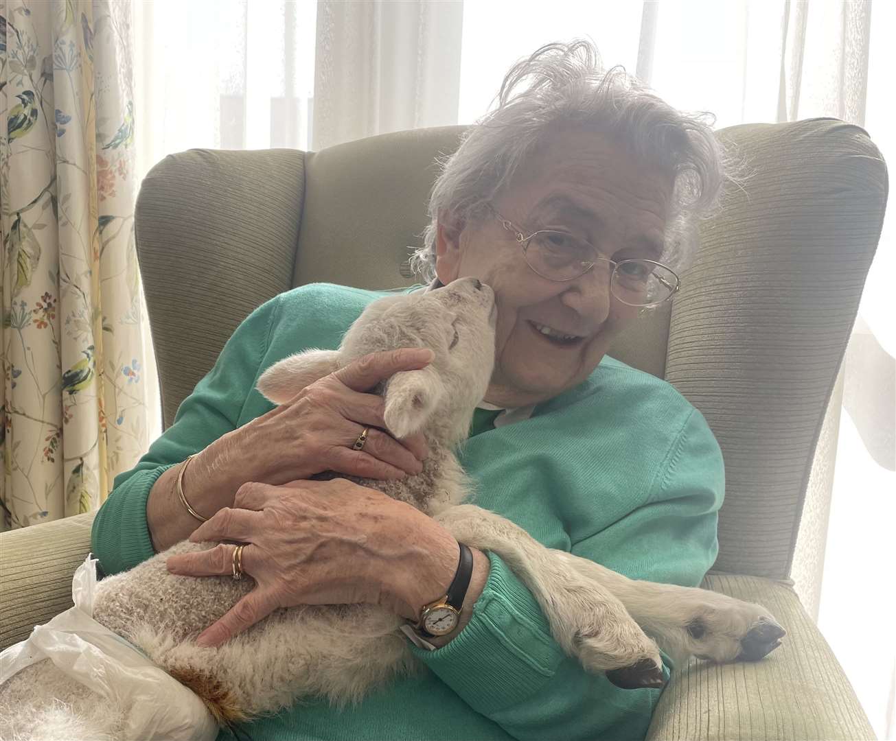 Resident Anita with one of the lambs. Picture: Harrier Lodge