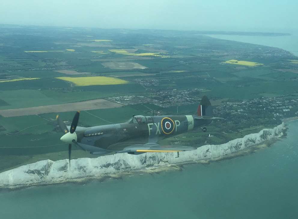 St George, a 1944 Spitfire flies over Dover as part of Aero Legend's Battle of Britain Memorial Flight