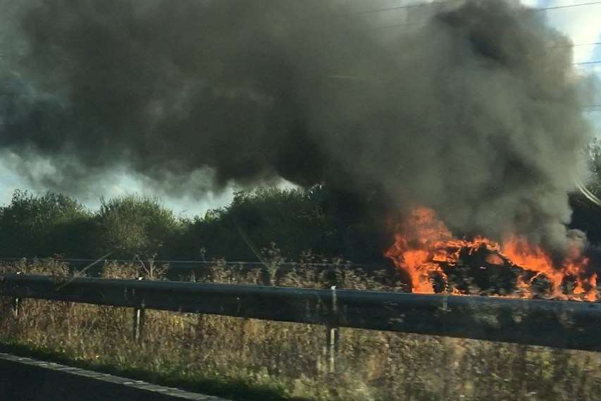 A huge car fire is causing major delays on the M20 between Ashford and Folkestone. Picture: Ashley Tanton