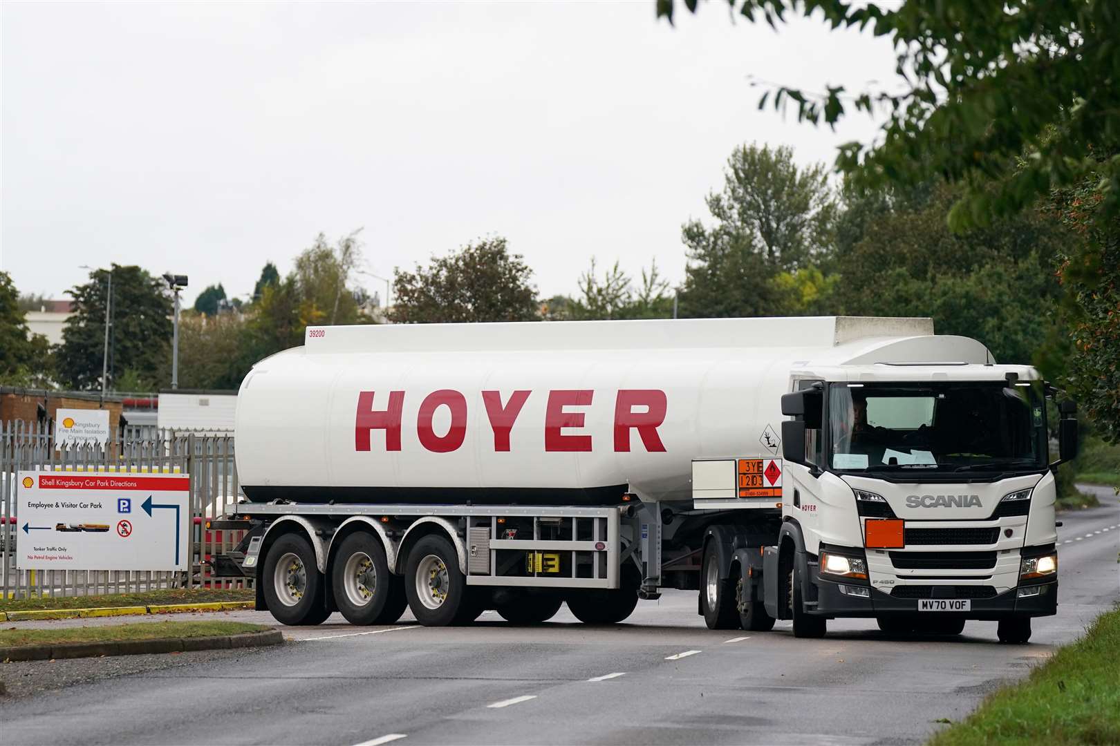 A fuel tanker departs a Shell oil depot in Kingsbury, Warwickshire (Jacob King/PA)