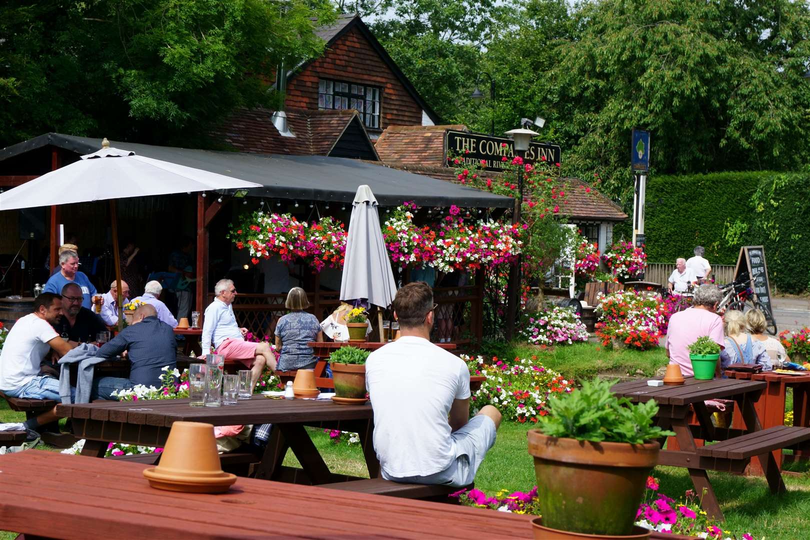 Drinkers can currently drink in a pub garden with friends. Picture: Stock