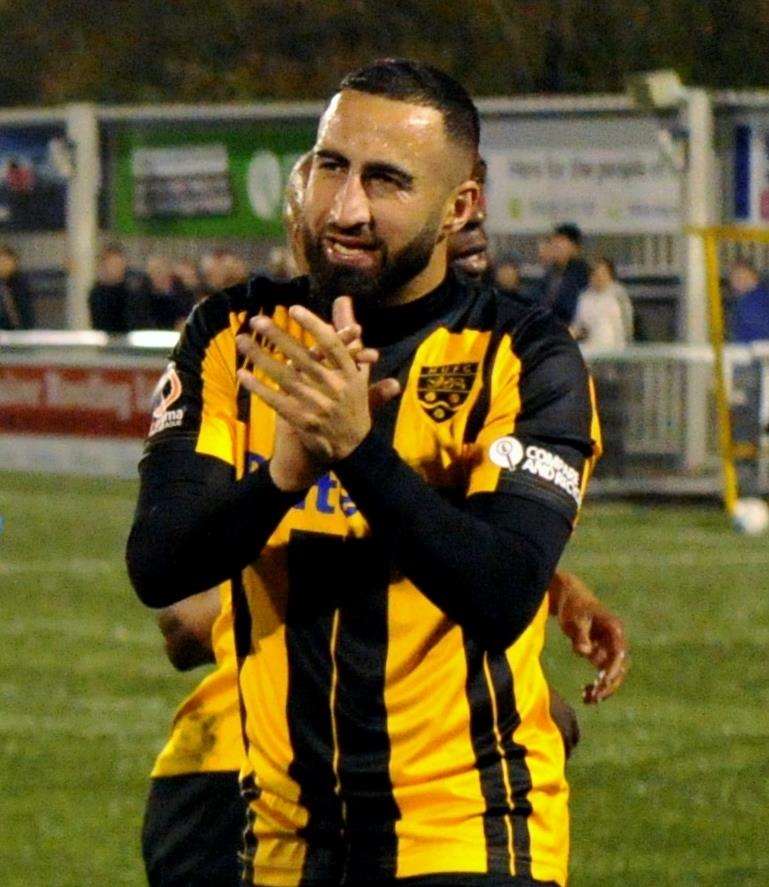 Aryan Tajbakhsh joins Maidstone's FA Cup celebrations after beating Macclesfield Picture: Steve Terrell