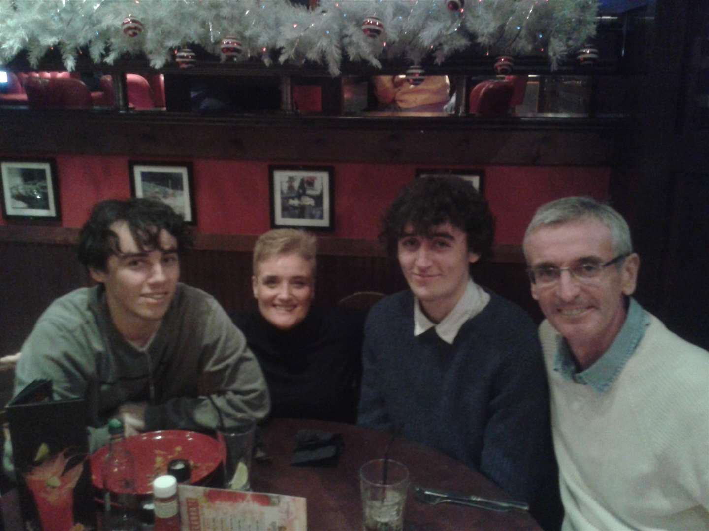 Christopher Innes, left, in January 2017, with mum Lesley, twin Stewart, and dad Brian