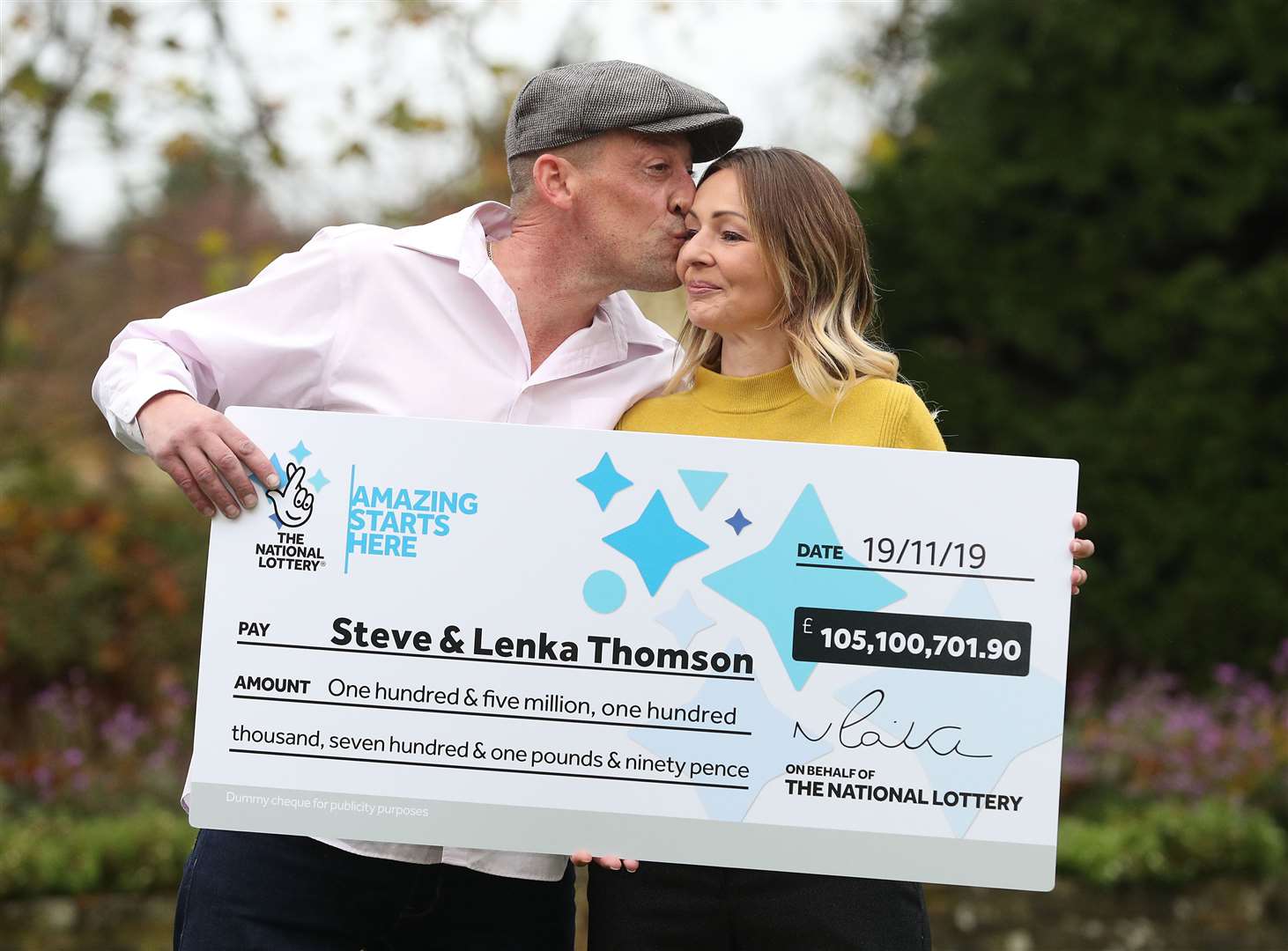 Self-employed builder Steve Thomson, and his wife Lenka Thomson, from Selsey, West Sussex, celebrate their £105 million EuroMillions win. (Andrew Matthews/PA)