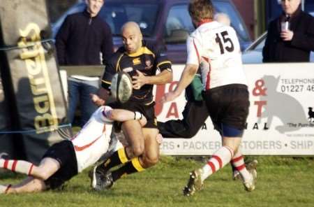 Canterbury's Mike Melford is brought to ground against Rugby Lions