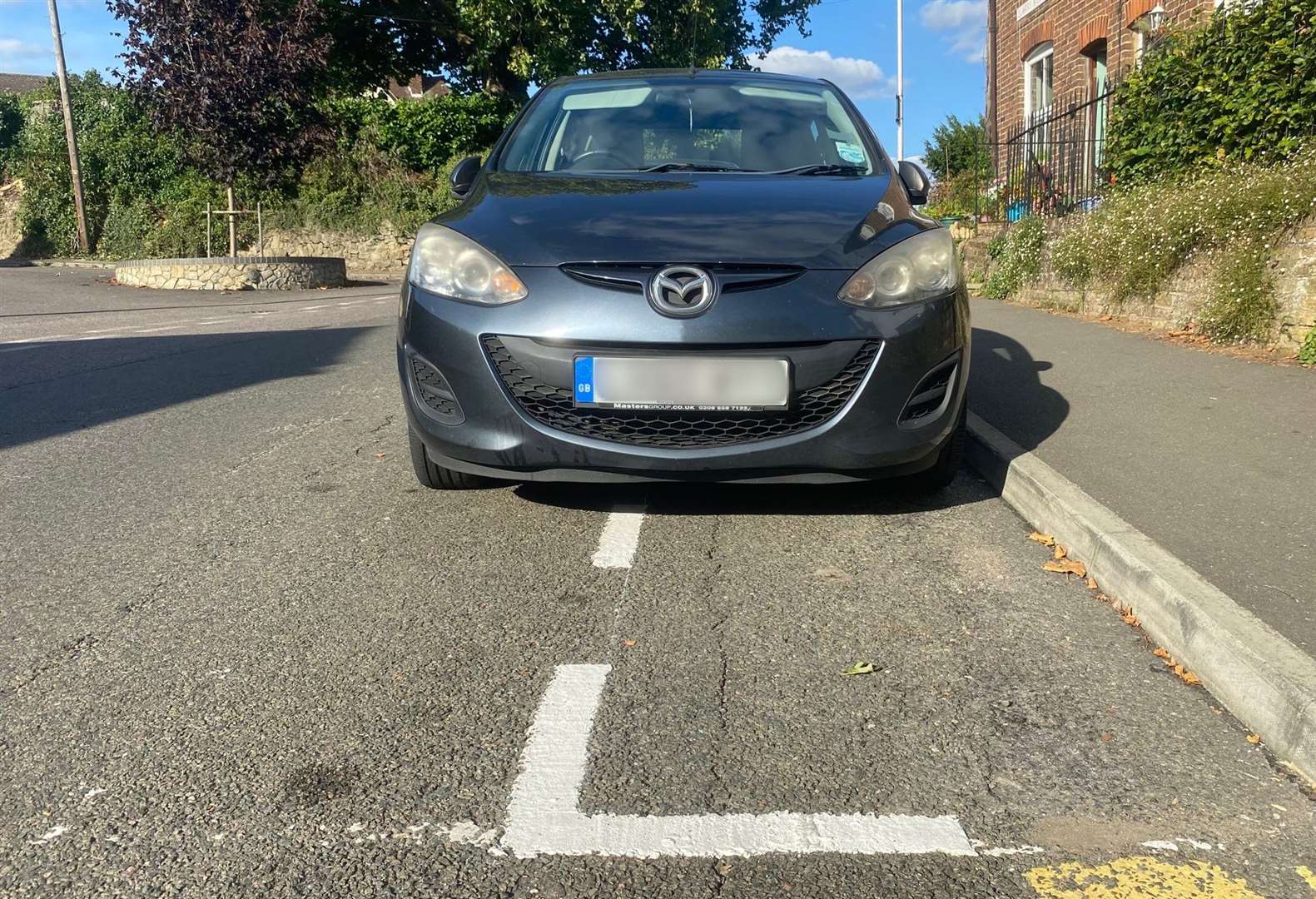 The newly painted lines are half the size of an average car