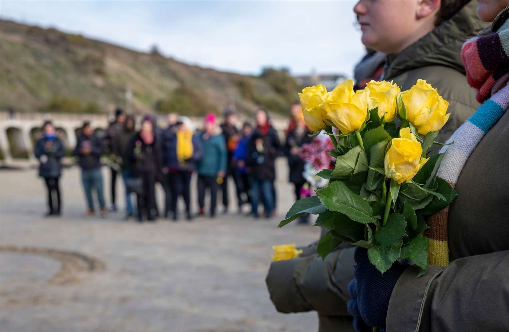 Local people gathered on Sunny Sands to remember the 27 who drowned. Picture: Andy Aitchison