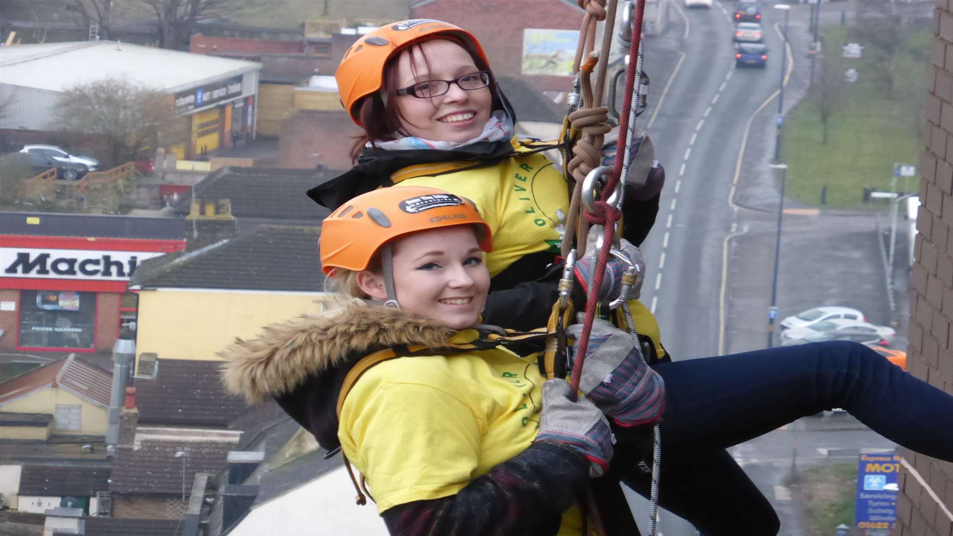 Abi Hankins of Sittingbourne and Daisy Hankins of Chatham took part in the KM abseil challenge at Miller House, Maidstone for the Oliver Fisher Special Care Baby Trust.