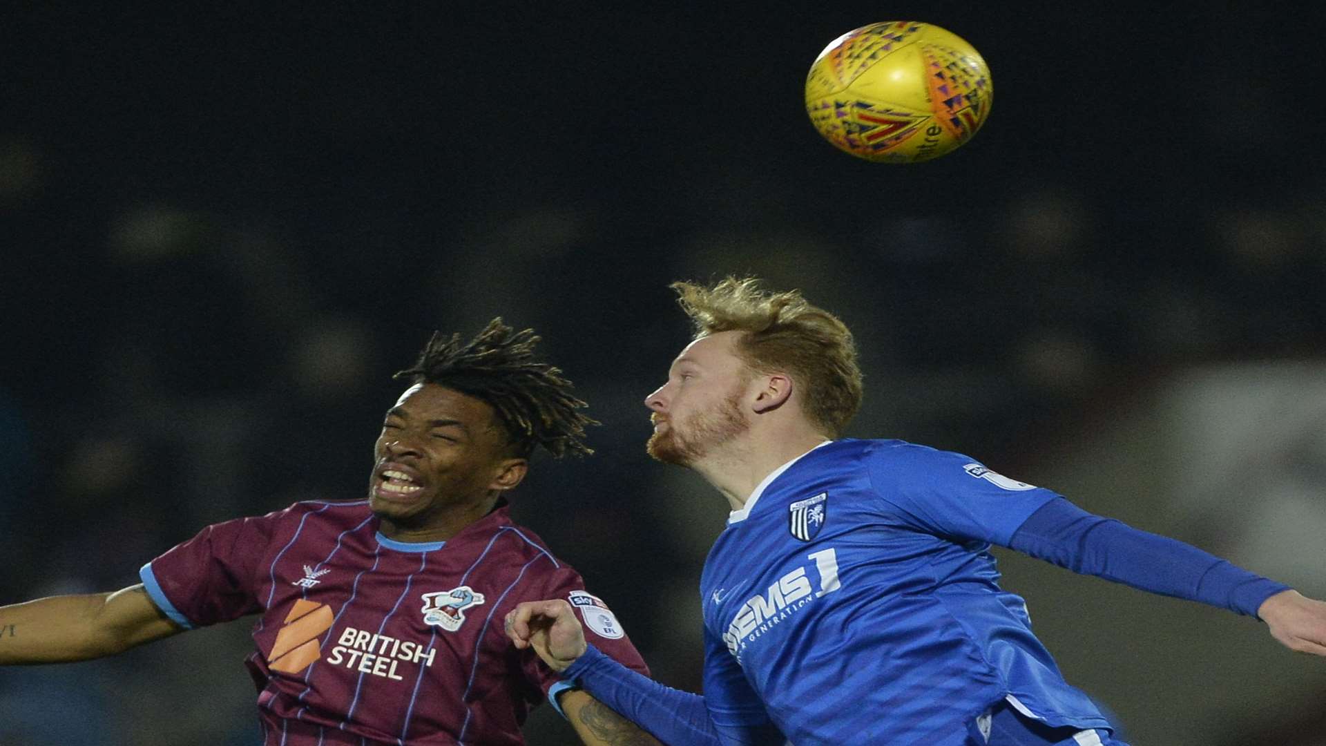 Connor Ogilvie and Ivan Toney in aerial combat Picture: Ady Kerry