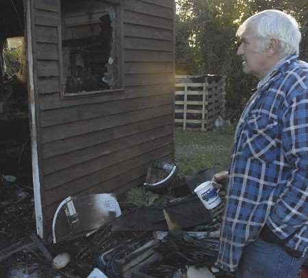 Rod Luckett surveys the debris of his workshop. Picture: ANDY PAYTON