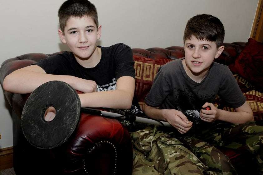 Kane Byrne, 12, with friend Alex Taylor who was with him when the first explosives were found