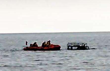 The Range Rover submerged in the sea off Sheppey