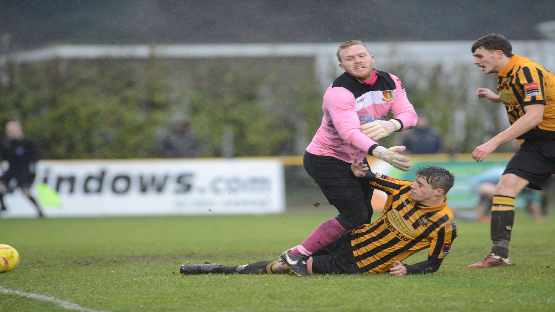 Callum Wraight slides in to score for Folkestone against Sittingbourne Picture: Gary Browne