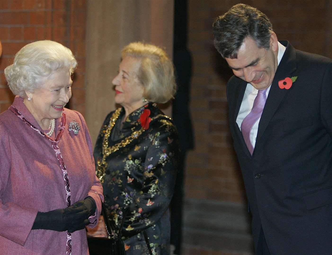 The Queen shares a joke with Gordon Brown as she opens St Pancras International station in London in 2007 (Kirsty Wigglesworth/PA)