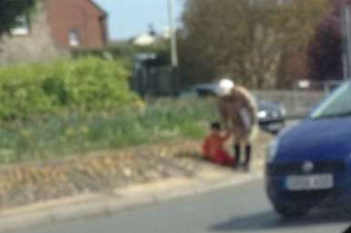 A woman captured on camera dragging a young child into traffic at the busy Wincheap roundabout