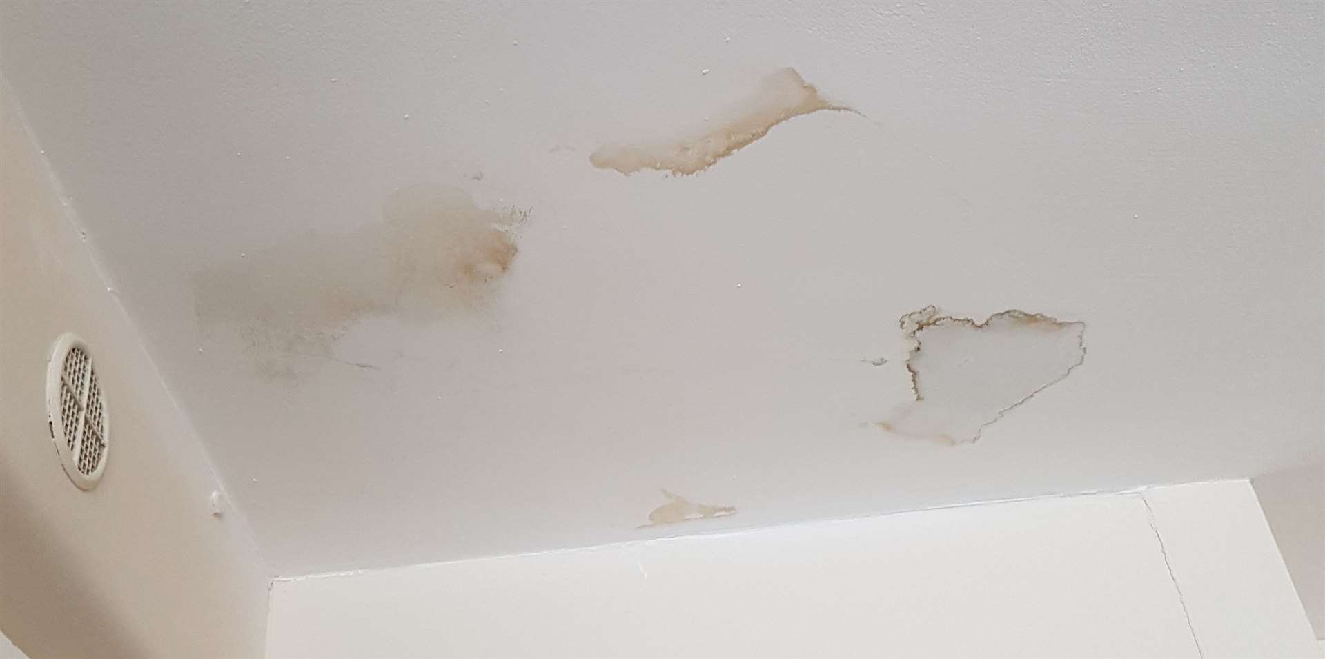 Water damage to Raymond's kitchen ceiling