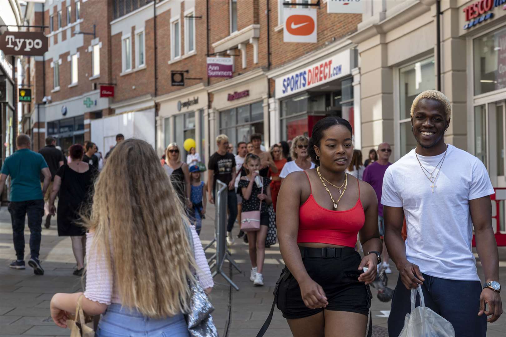 Shoppers in Whitefriars, Canterbury, making the most of the good weather. Picture: Jo Court