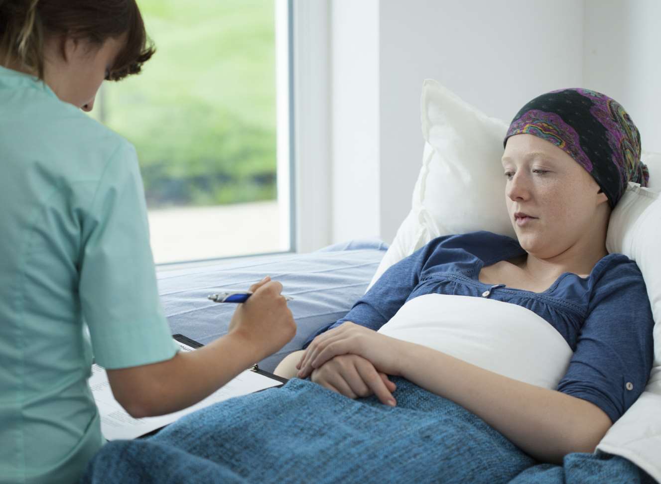 A cancer patient is being checked over in hospital. iStock image.
