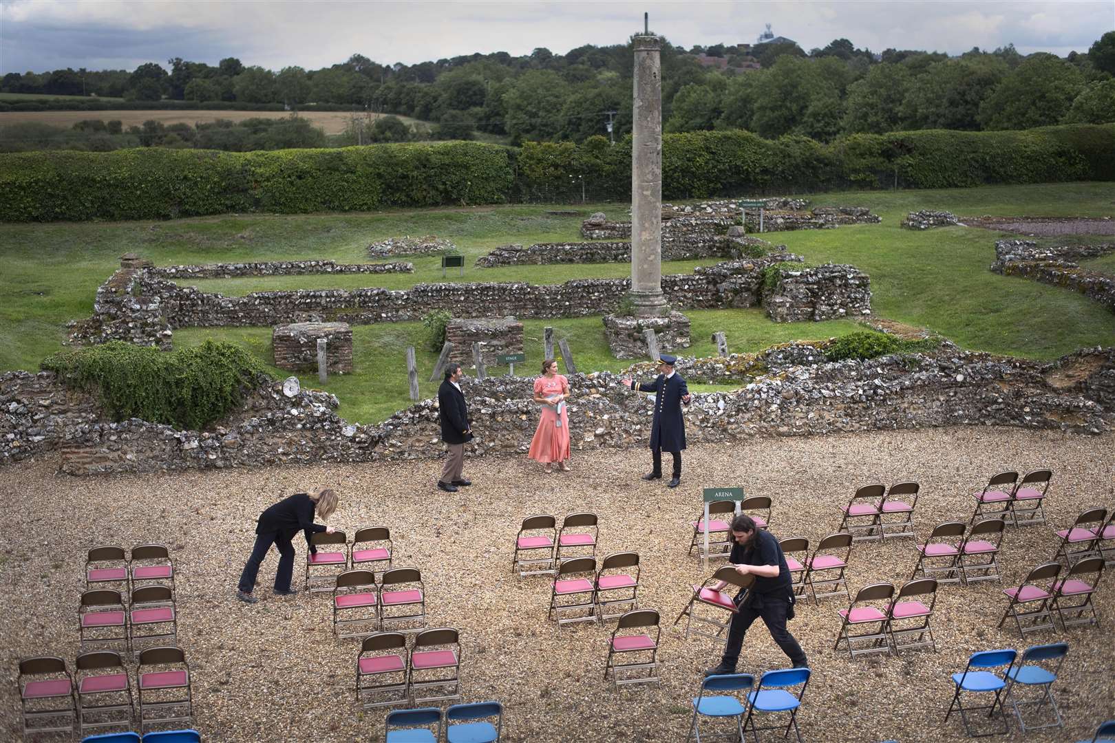 Production crew space chairs apart as David Widdowson, Emma Wright and Will Forester as Antonia, Olivia and Orsino in William Shakespeare’s Twelfth Night rehearse together for the first time at the Roman Open Air Theatre in St Albans, Hertfordshire (Victoria Jones/PA)