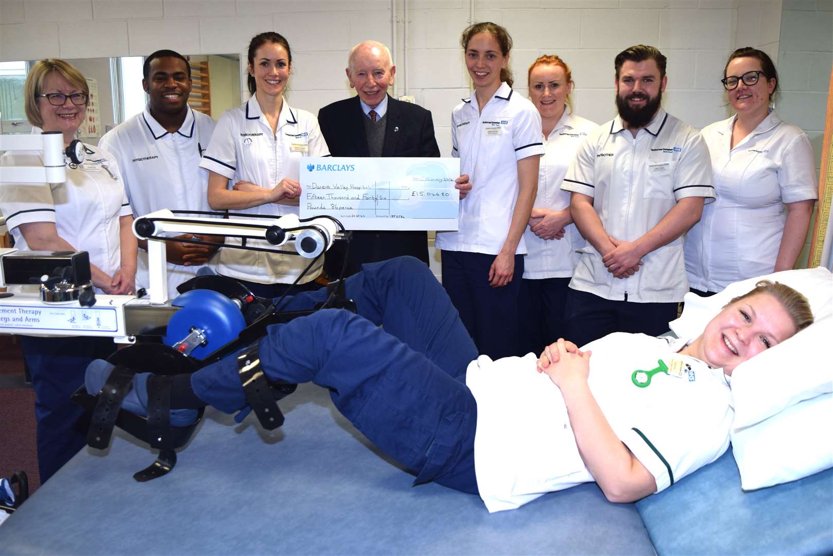 John Surtees CBE arranged a pit stop at Darent Valley Hospital to present a cheque for £15,046.80.