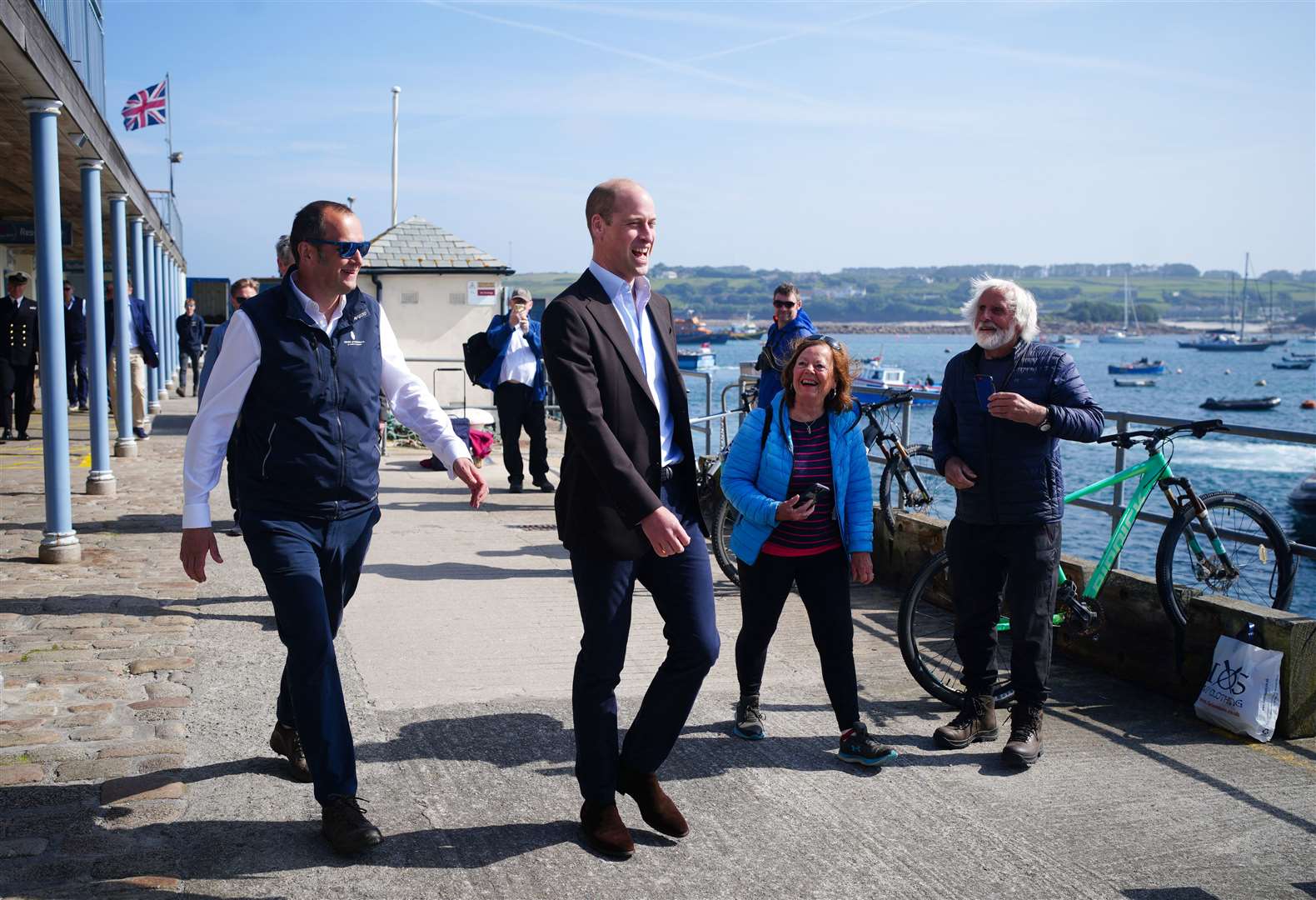 The Duke of Cornwall during a visit to St Mary’s Harbour (Ben Birchall/PA)