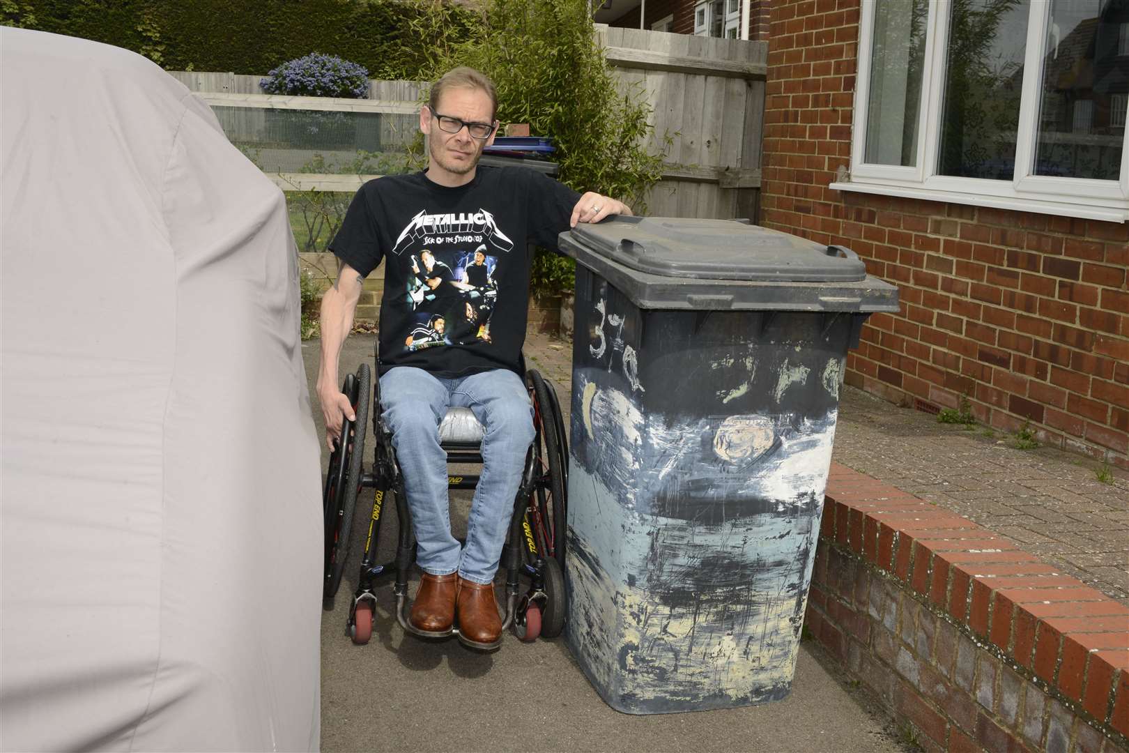 Mike Beeforth has difficulty getting past his waste bin